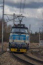 Blue passenger Czech old train in Velesin station in winter day