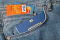 Blue passport with credit cards in pocket of jeans closeup Royalty Free Stock Photo