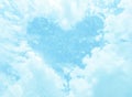 Blue pastel colour of heart shape white cloud and sky background. Royalty Free Stock Photo