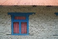 Blue pastel window on the white Stone house wall - texture background - image from nepal poonhill Royalty Free Stock Photo