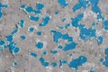 Blue peeling paint on the wall. Old concrete wall with cracked flaking paint Royalty Free Stock Photo