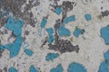 Blue peeling paint on the wall. Old concrete wall with cracked flaking paint. Royalty Free Stock Photo