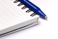 Blue pen on blank notebook Royalty Free Stock Photo