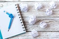 Blue Pencil with knot on writing pad on white wood background Royalty Free Stock Photo
