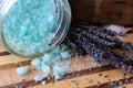 Blue bath salts and lavender flowers Royalty Free Stock Photo