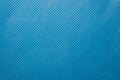 Blue perforated leather background