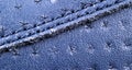 Blue perforated leather texture background. Blue Leather with stitching close up. Macro shot of shiny leather texture. Royalty Free Stock Photo