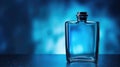 Blue perfume bottle on a blue background. Mockup men perfume bottle Royalty Free Stock Photo