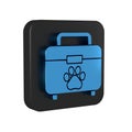 Blue Pet first aid kit icon isolated on transparent background. Dog or cat paw print. Clinic box. Black square button. Royalty Free Stock Photo