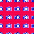 Blue Photo camera icon isolated seamless pattern on red background. Foto camera icon. Vector Illustration Royalty Free Stock Photo