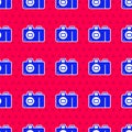 Blue Photo camera icon isolated seamless pattern on red background. Foto camera icon. Vector Royalty Free Stock Photo