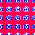 Blue Photo camera icon isolated seamless pattern on red background. Foto camera icon. Vector Royalty Free Stock Photo