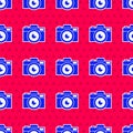 Blue Photo camera icon isolated seamless pattern on red background. Foto camera icon. Vector Illustration Royalty Free Stock Photo