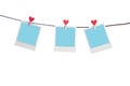 Blue photoframes with red heart clothepins Royalty Free Stock Photo