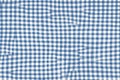 Blue picnic blanket fabric with squared patterns and texture