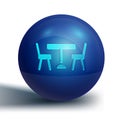 Blue Picnic table with chairs on either side of the table icon isolated on white background. Blue circle button. Vector