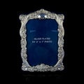 Blue picture frame isolated on a black background. Royalty Free Stock Photo