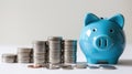 The blue piggy bank and coins.AI generated image Royalty Free Stock Photo