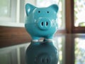 Blue piggy bank, idea for saving money for future Royalty Free Stock Photo