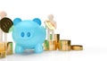 Blue piggy bank and wood figure hold gold coins for business content 3d rendering