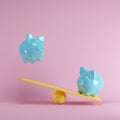 Blue piggy banks playing with yellow seesaw on pink background