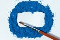 blue pigment, dry paint on a white background, macro Royalty Free Stock Photo