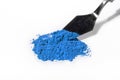 blue pigment, dry paint on a white background, macro Royalty Free Stock Photo