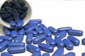 Blue pills and bottle Royalty Free Stock Photo