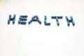 Blue pills forming the word health perspective view Royalty Free Stock Photo