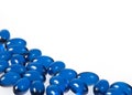 Blue pills isolated on white Royalty Free Stock Photo