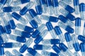 Blue pills isolated on white Royalty Free Stock Photo