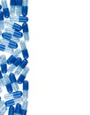 Blue pills isolated on white Royalty Free Stock Photo