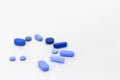 Blue pills for male impotence. Concept of erectile dysfunction in men post COVID-19. Free space to write