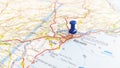 A blue pin stuck in Alicante on a map of Spain