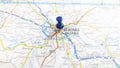 A blue pin stuck in Belgrade on a map of Serbia Royalty Free Stock Photo