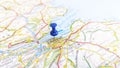 A blue pin stuck in Edinburgh on a map of Scotland Royalty Free Stock Photo