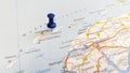 A blue pin stuck in the island of Terschelling on a map of the Netherlands Royalty Free Stock Photo