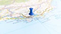 A blue pin stuck in Toulon on a map of France Royalty Free Stock Photo