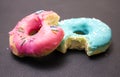 Blue and pink bitten donut Royalty Free Stock Photo