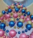 Blue, pink and golden hanging decorative balls Royalty Free Stock Photo
