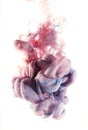 Blue and pink ink color drop underwater Royalty Free Stock Photo