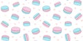 Seamless background with blue and pink macaroons and small hearts. French sweet pastries Royalty Free Stock Photo