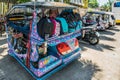 Blue-pink motor-tricycle taxi in Puerto Princesa, Palawan, Philippines