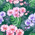 Blue and pink orchid flowers and big monstera leaves on dark green background. Seamless floral pattern. Watercolor painting. Royalty Free Stock Photo