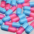 Blue and pink pills