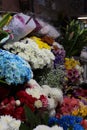 Blue, Pink, Red and White Bunches of Flowers, Municipal Market, near Rue Heliodoro Salgado,Panaji, Goa, India Royalty Free Stock Photo