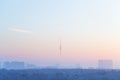 Blue pink sky over city and TV tower in sunrise Royalty Free Stock Photo