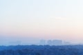 Blue and pink sky over city in winter sunrise Royalty Free Stock Photo