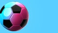 Blue and pink soccer ball on blue text space.