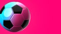 Blue and pink soccer ball on pink text space.